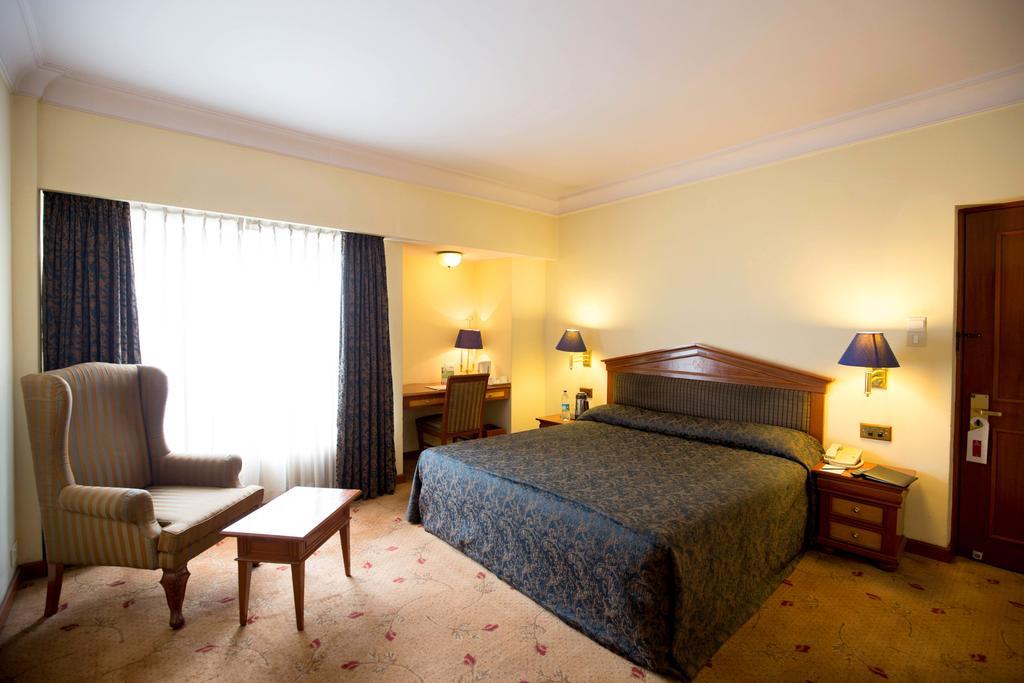 Hotel Sagar Plaza City Centre Púna Pokoj fotografie